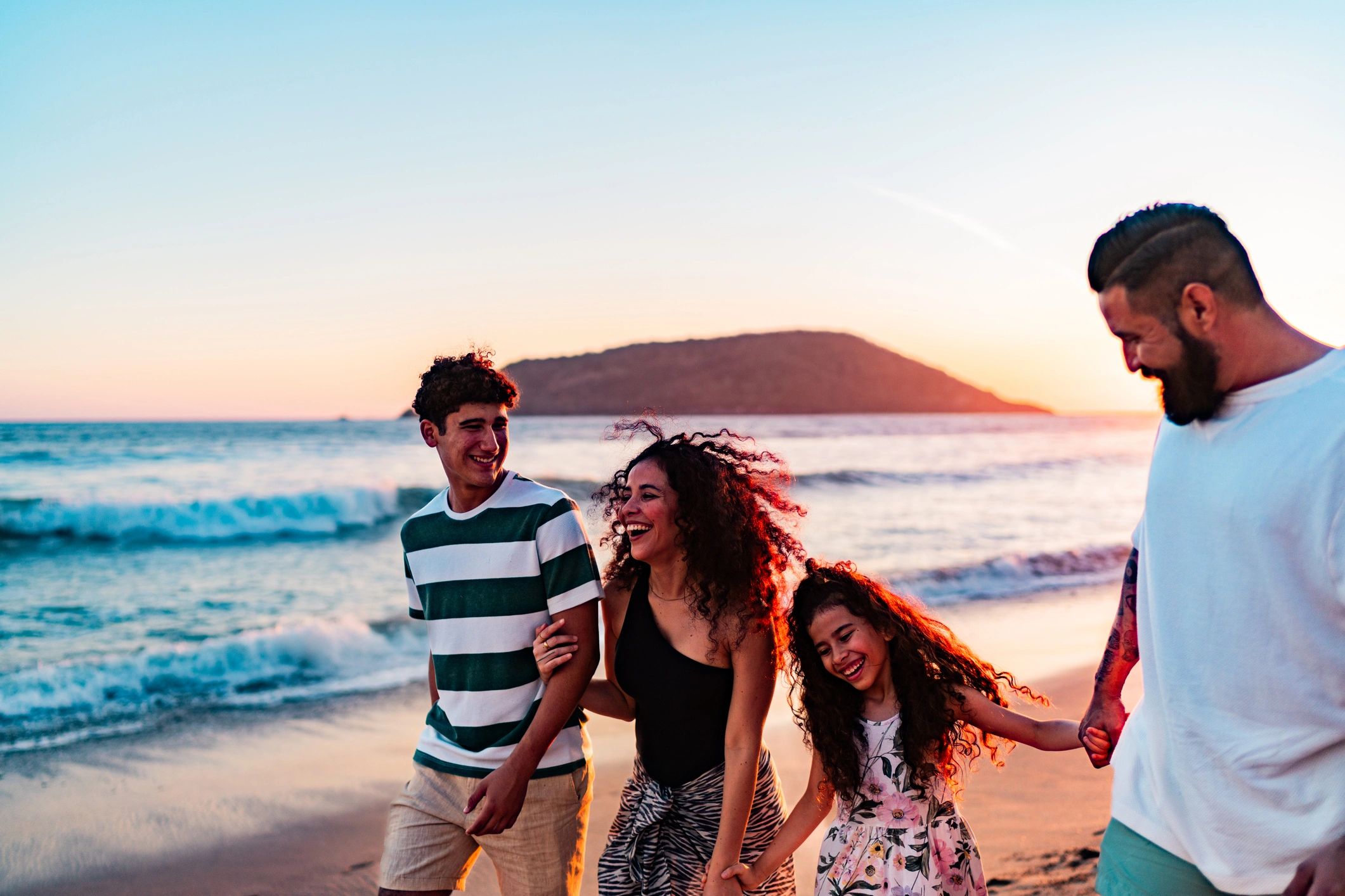 Happy family on vacation beach